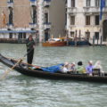 gondolier using cellphone