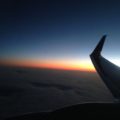sunset over a plane wing