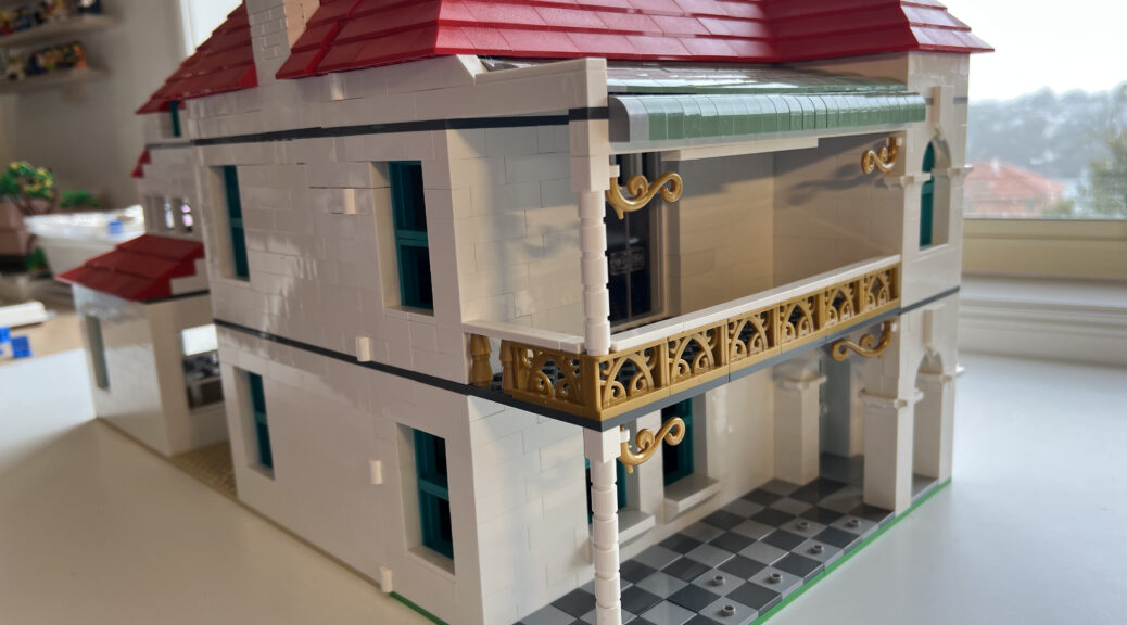 Lego house showing front and side view